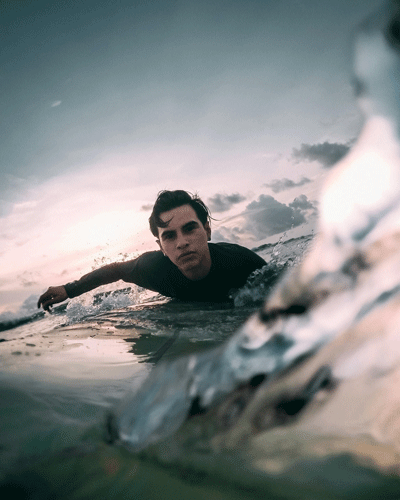 Surfer catching a wave